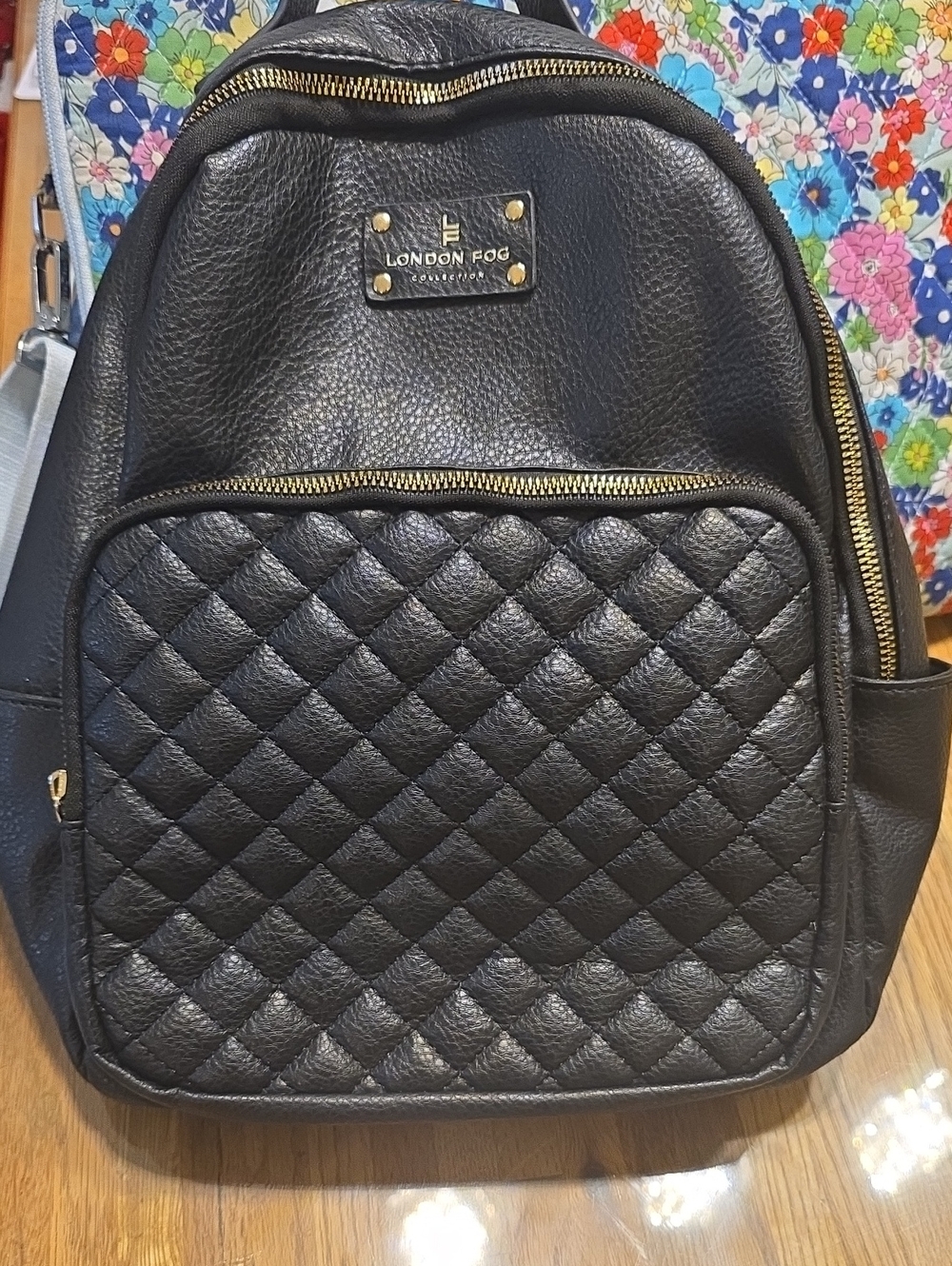 London Fog Black Quilted Backpack with Gold Hardware